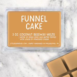 3 oz Funnel Cake beeswax and coconut wax melt on Marble background. Notes of fresh fried fair batter topped with loads of powdered sugar. Simply handmade in Philadelphia, PA.