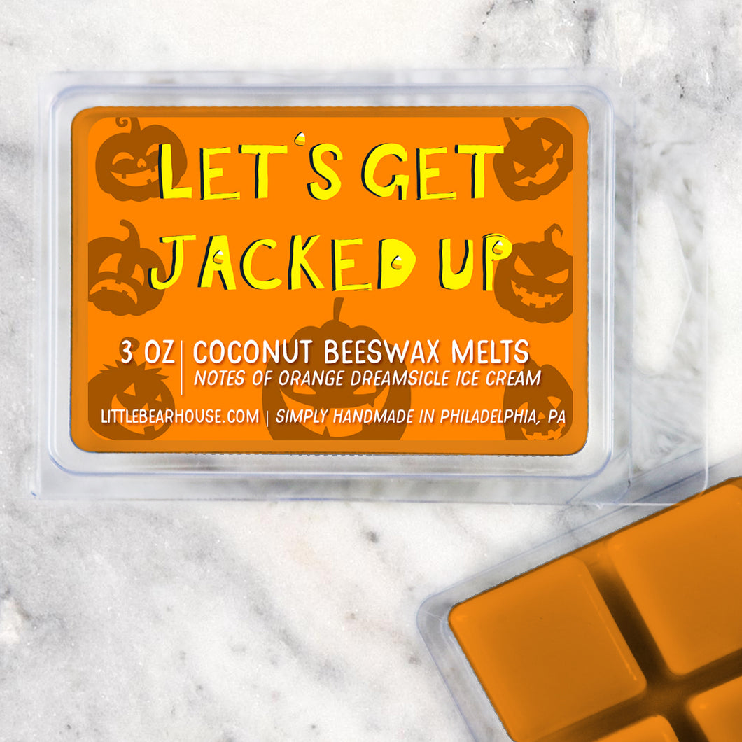 3 oz Let's Get Jacked Up beeswax and coconut wax melt on Marble background. Notes of orange dreamsicle ice cream. Simply handmade in Philadelphia, PA.