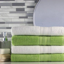 Load image into Gallery viewer, freshly laundered green and white folded towels with a green laundry detergent wax scent
